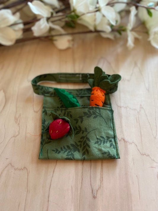 Green apron with food